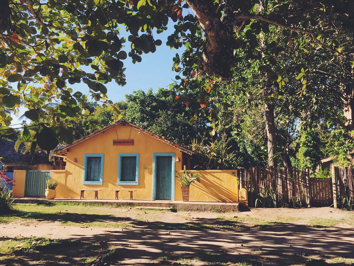 outdoors green and yellow cement house building
