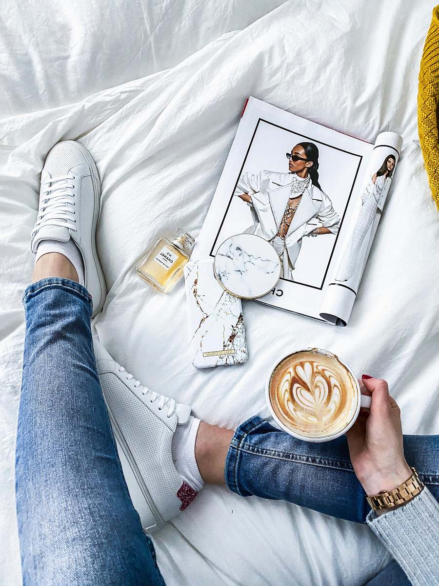 clothing woman holding cup person