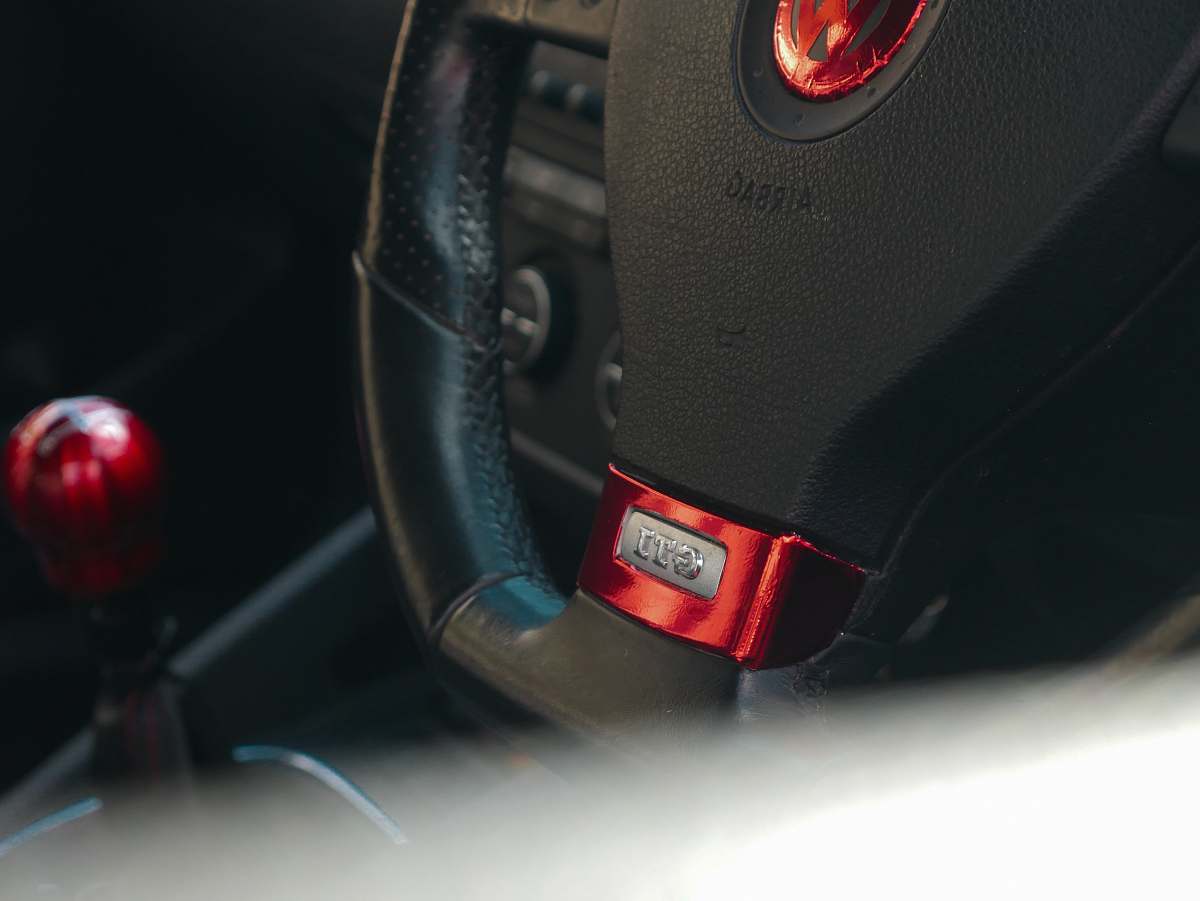accessory black and red honda steering wheel belt