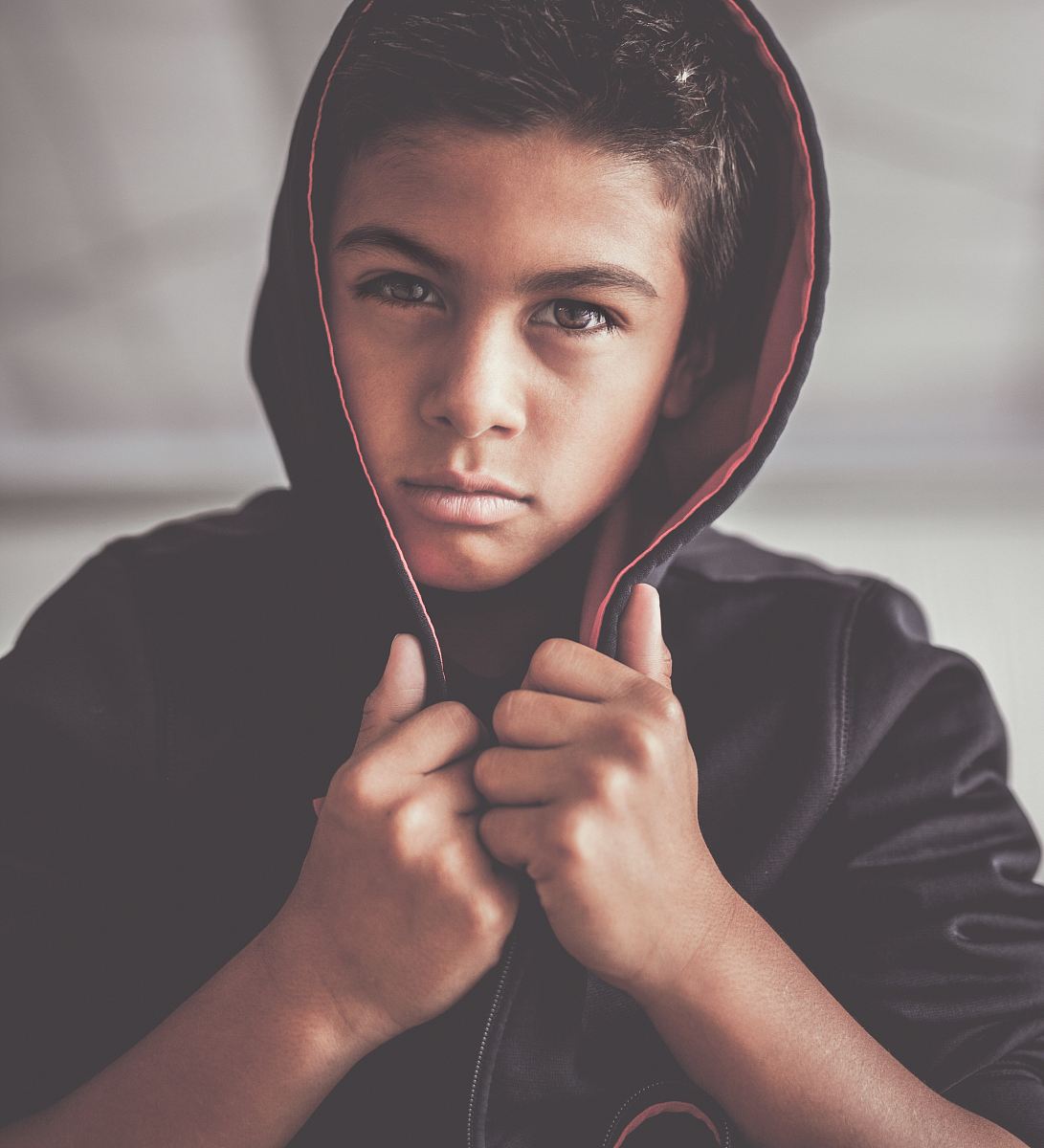 boy in black hoodie
