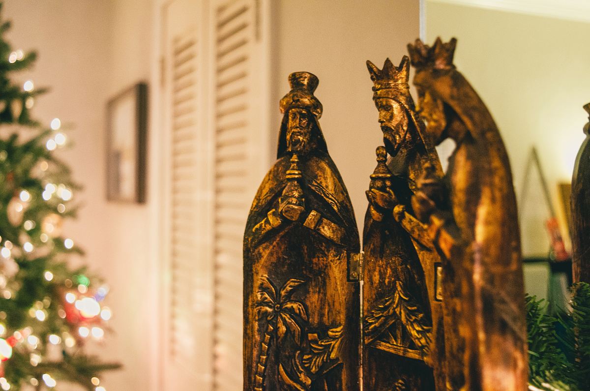 selective focus photography of religious figurines