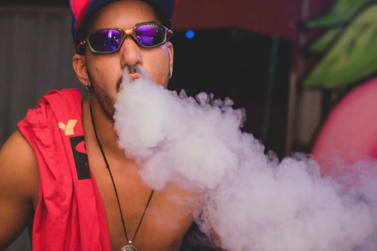 accessory smoke coming out of man's nostrils sunglasses