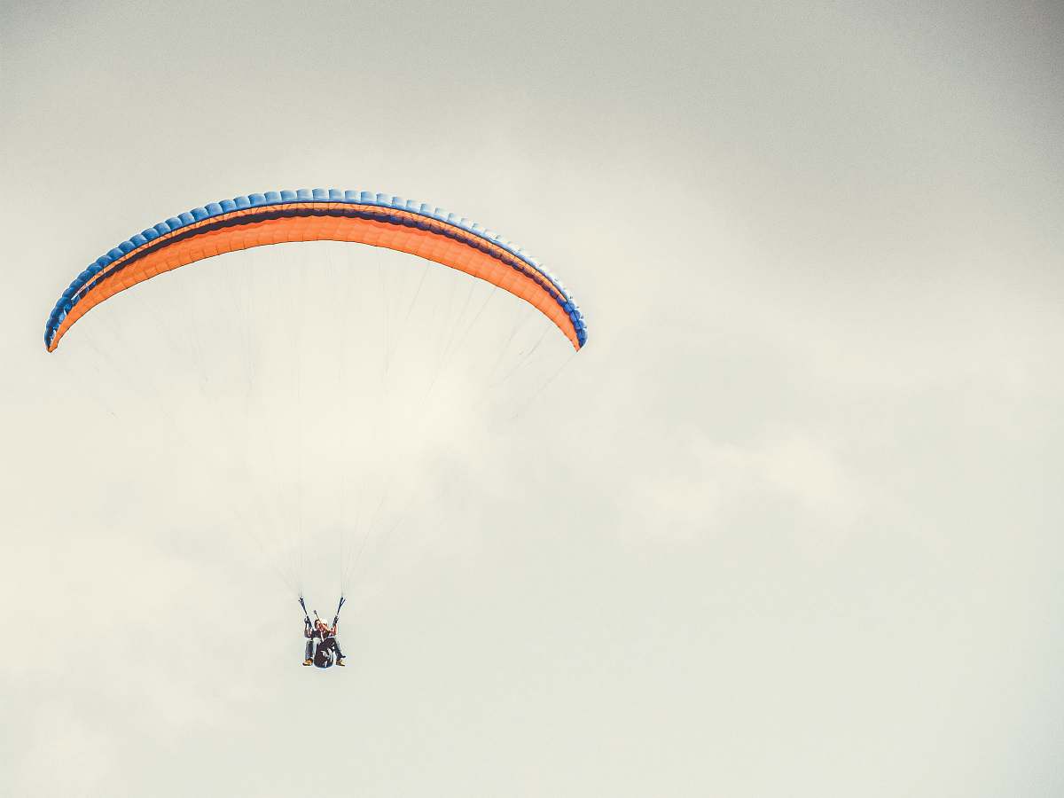 Gliding Orange And Blue Parachute Leisure Activities Image Free Photo