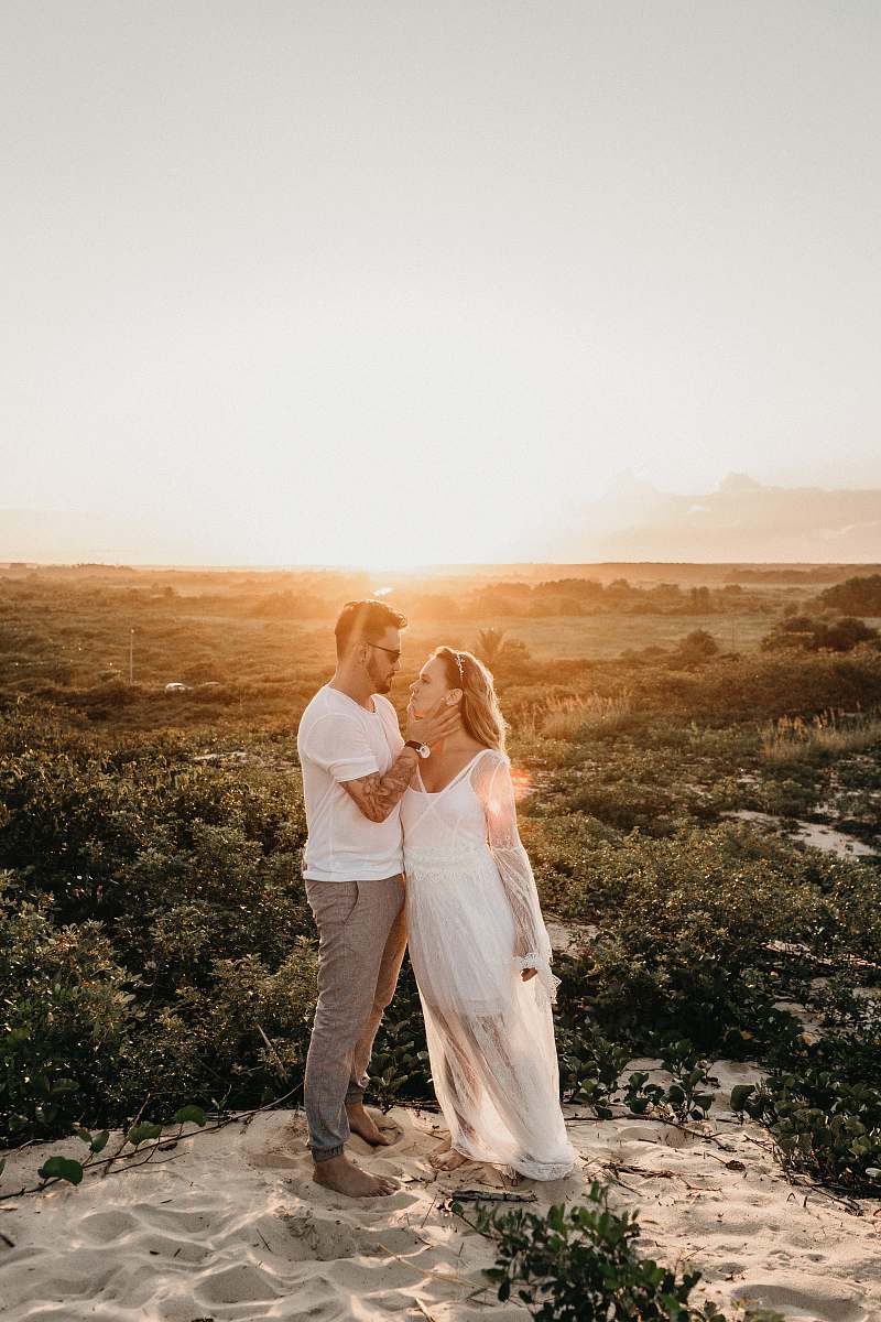 clothing man and woman wearing white clothes person