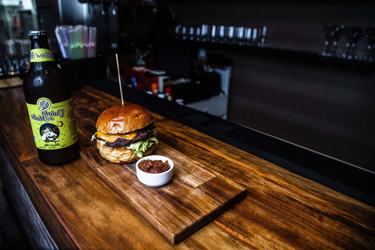 food burner beside brown bottle são paulo
