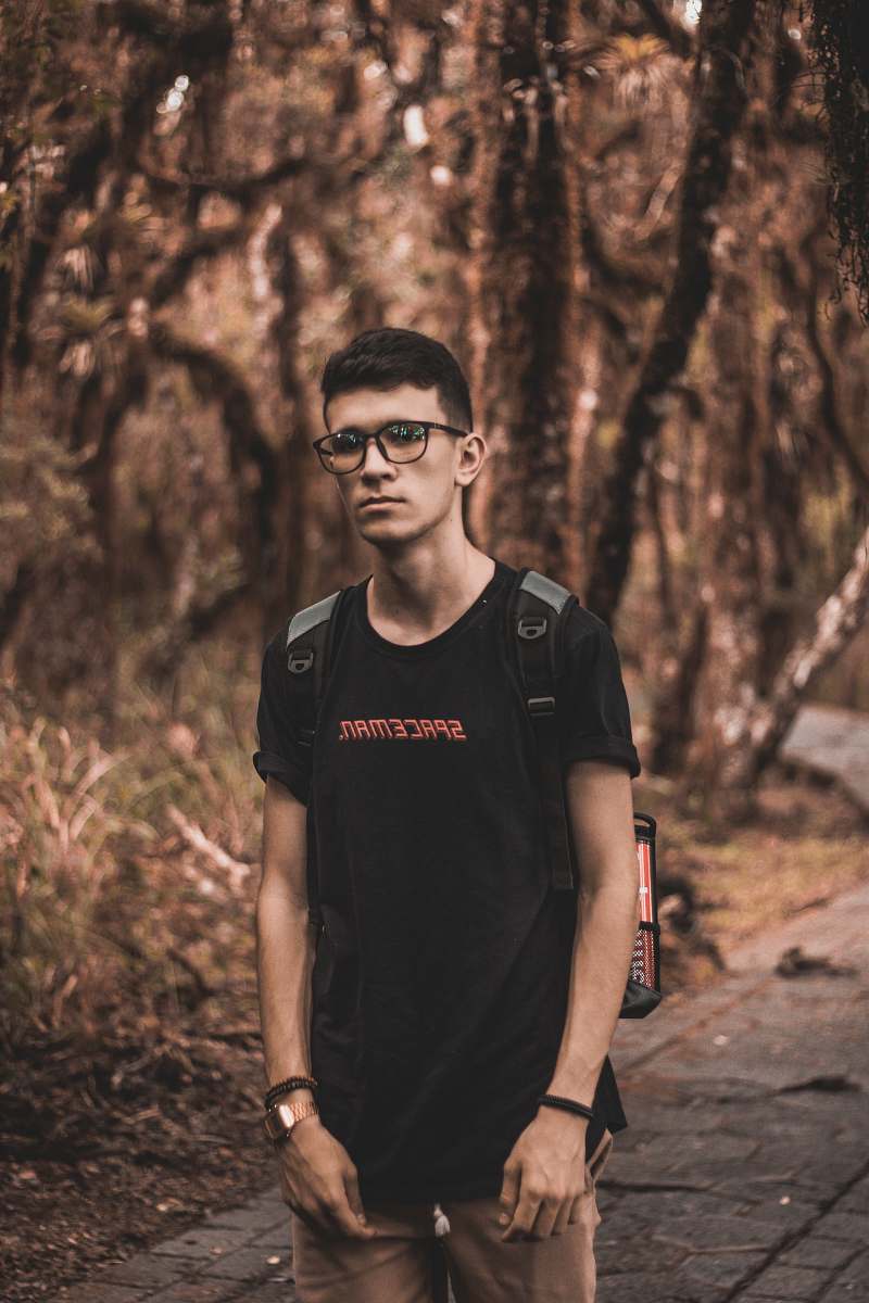 person man wearing black spaceman shirt people