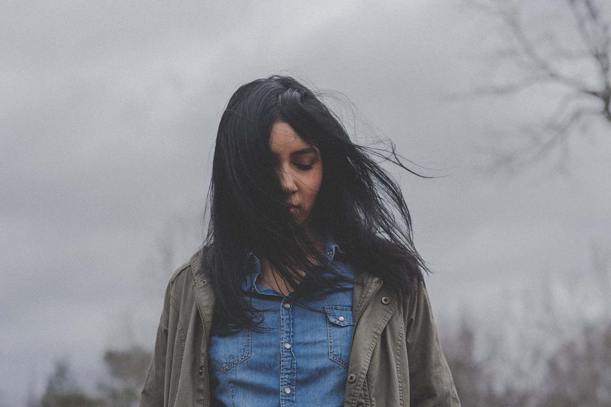 people woman in denim button-up shirt woman