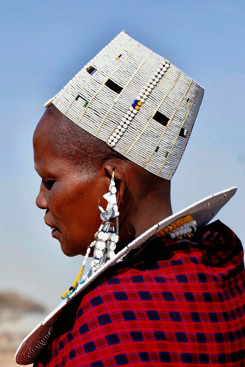 human selective focus photography of woman wearing traditional dress person