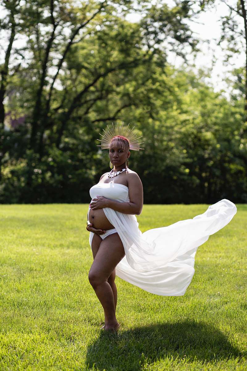 human pregnant woman holding her tummy people