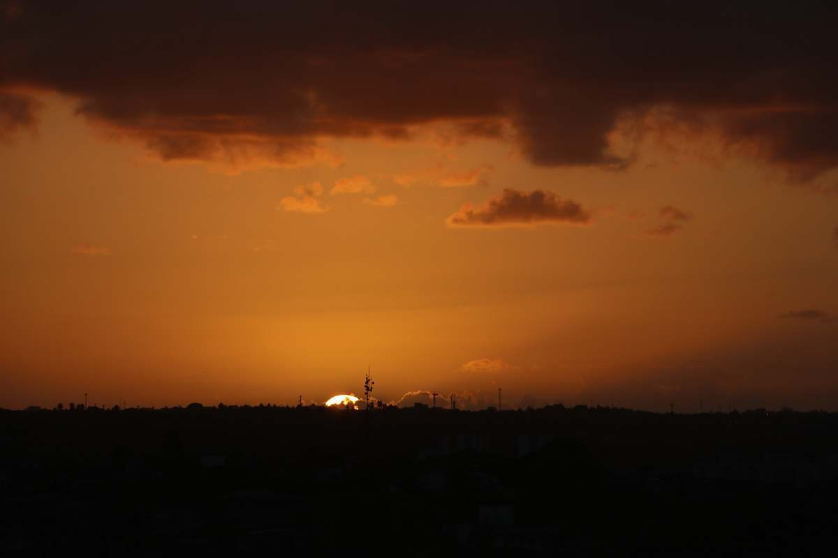 brown silhouette of mountain at golden hour dawn