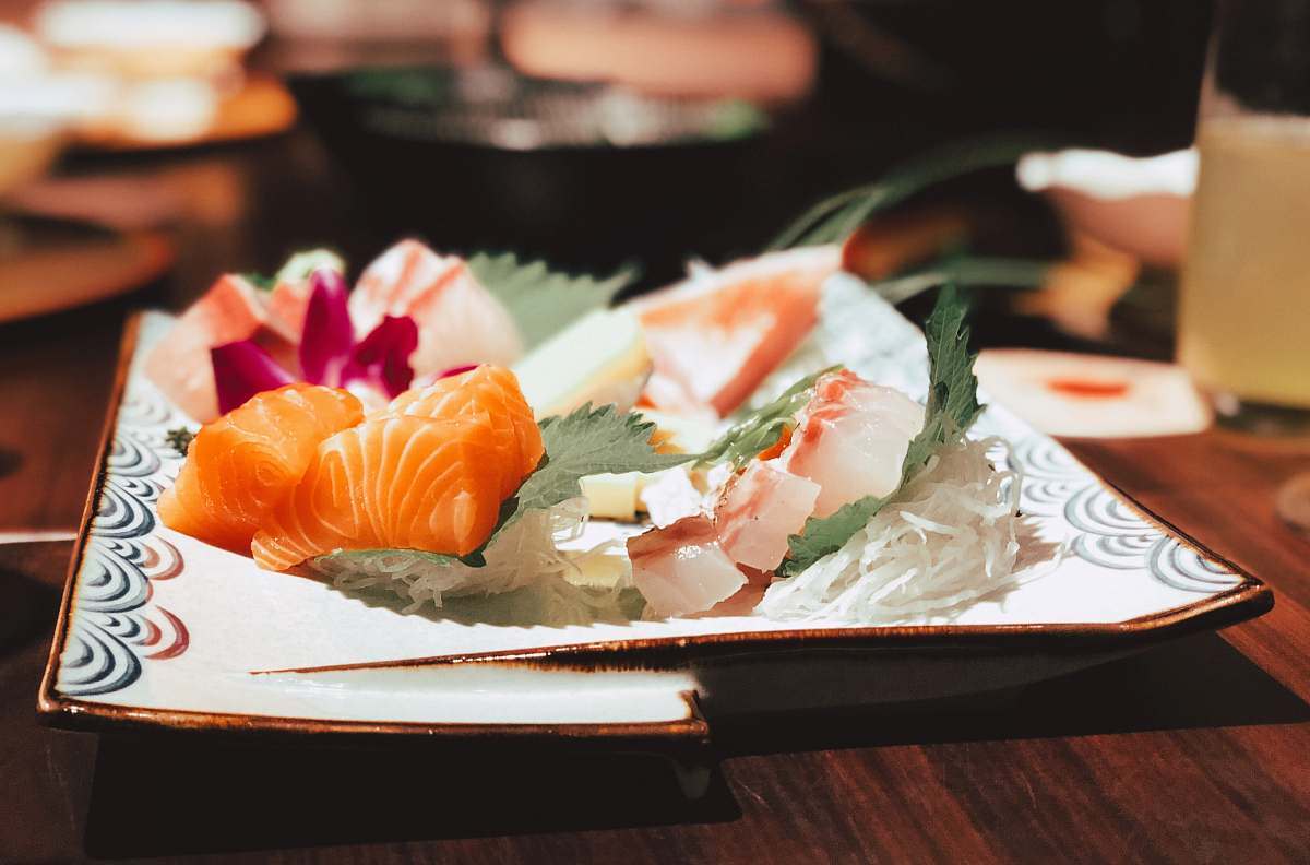 sushi plate of sushi on wooden table 21 ngách 2 ngõ 294