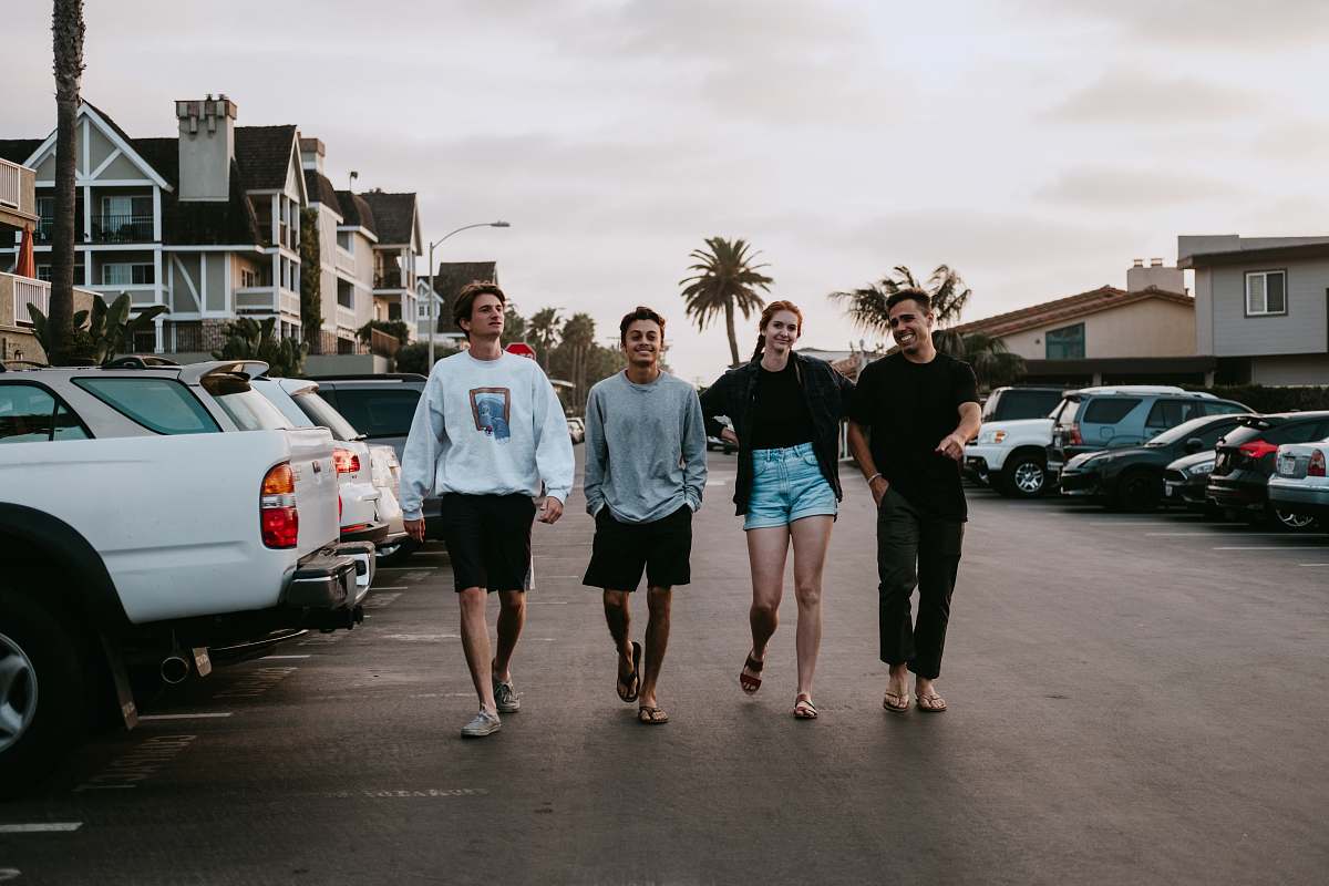 person four person walking near vehicle people