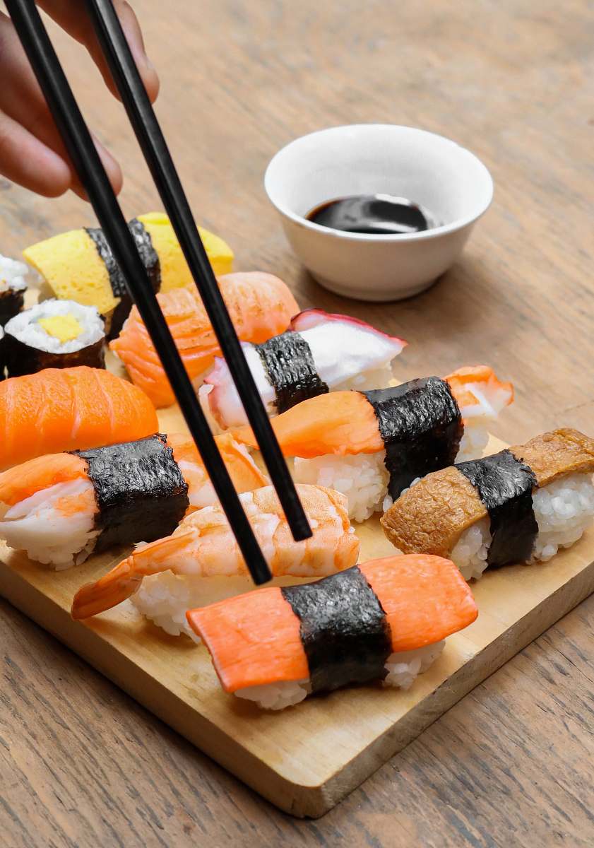 food sushi on wooden tray burger