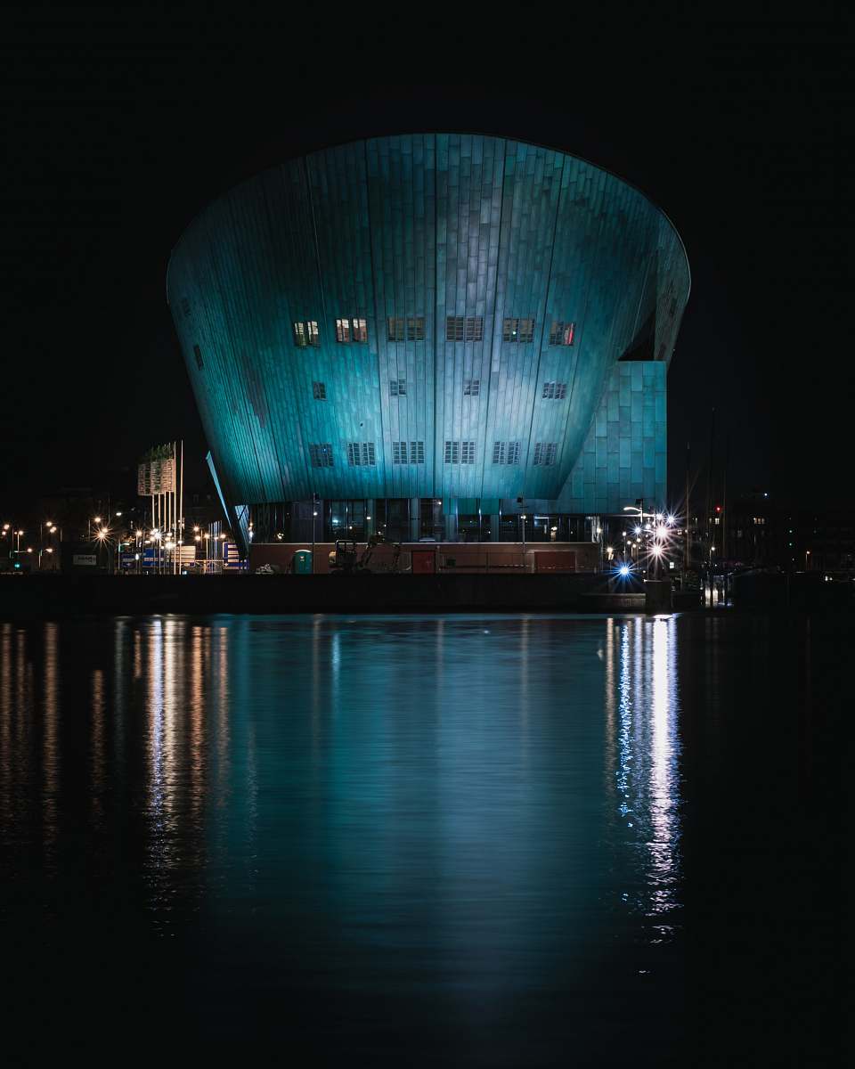 planetarium body of water near building during nighttime architecture