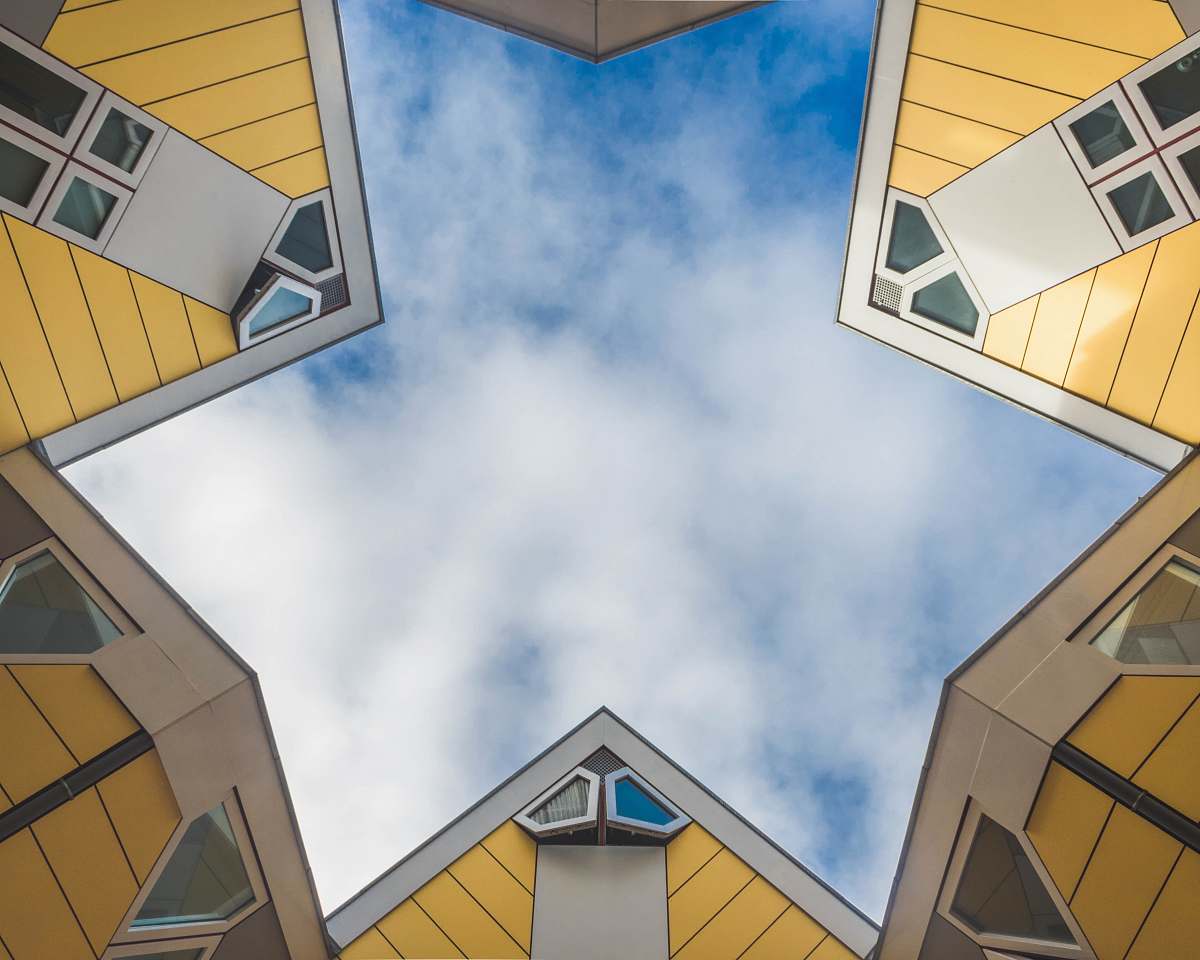 building low angle photography of blue sky rotterdam