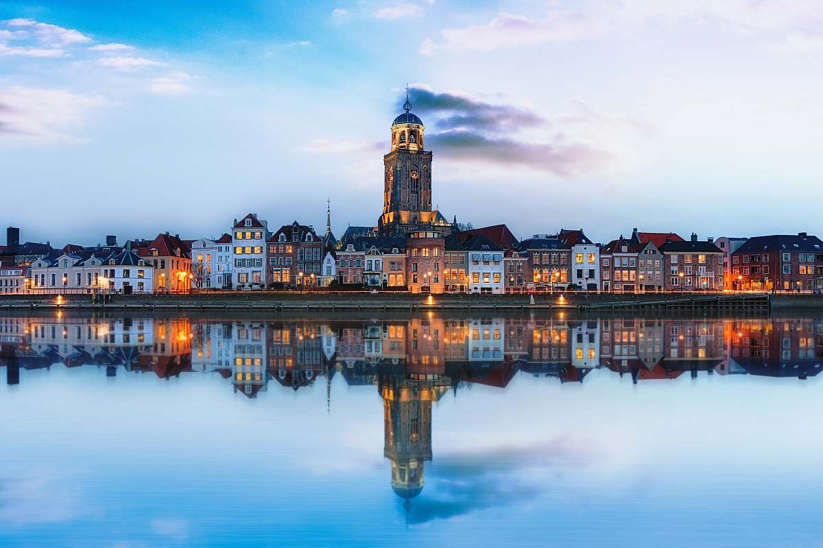 architecture lighted buildings across placid lake building