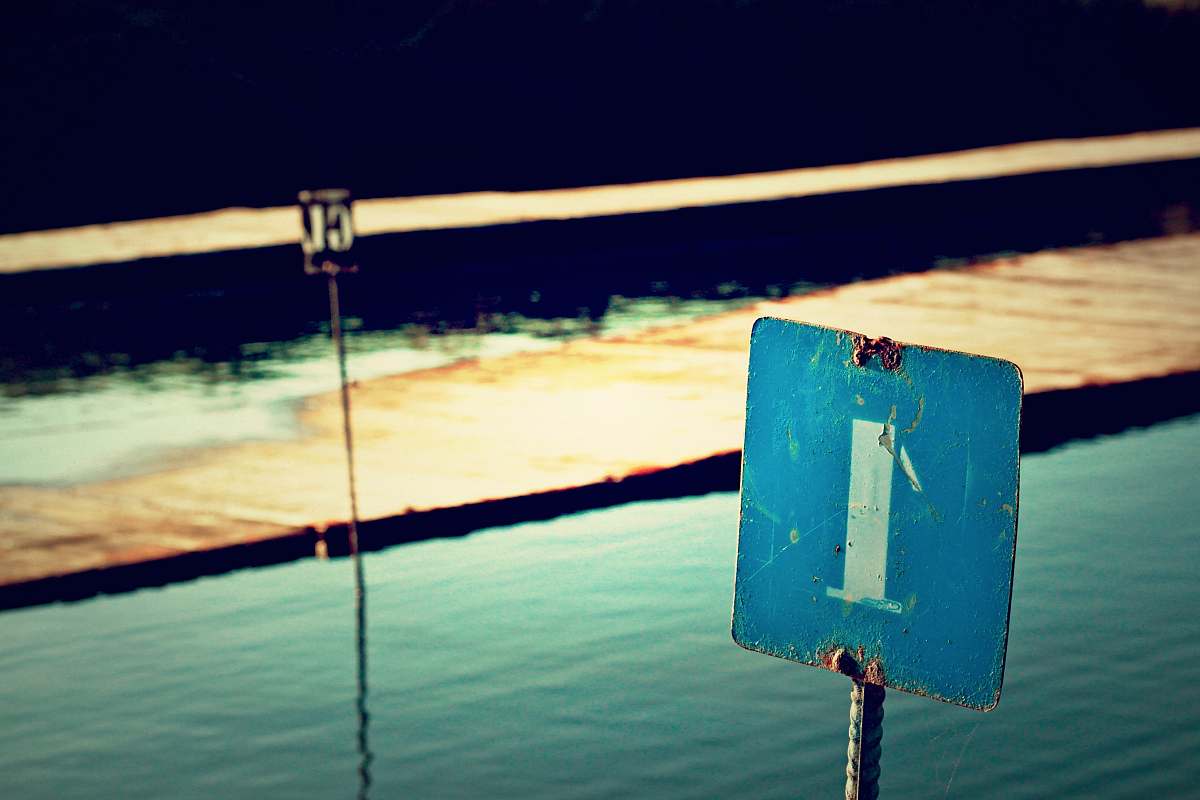 pole close-up photography of number 1 signage sign