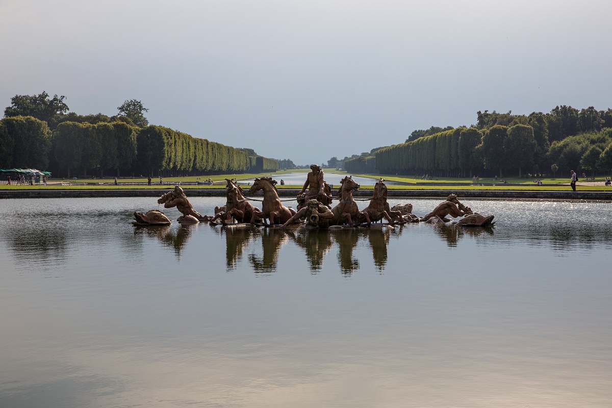 versailles statue of horses on body of water at daytime water