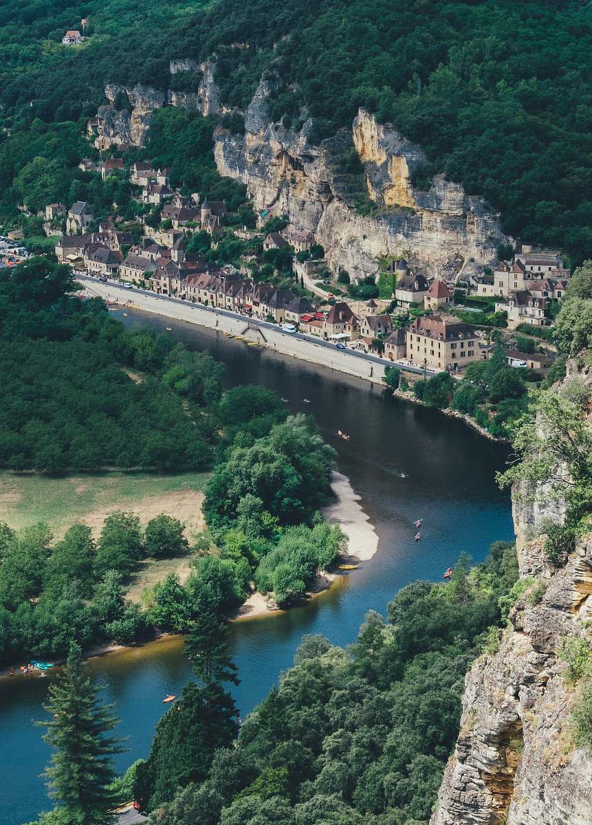 river aerial view of building beside water outdoors