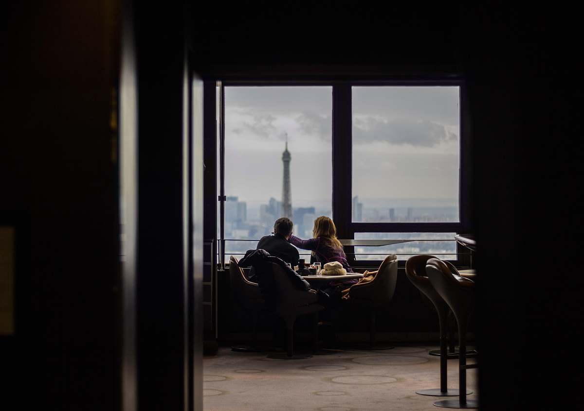people couple sitting while eating human
