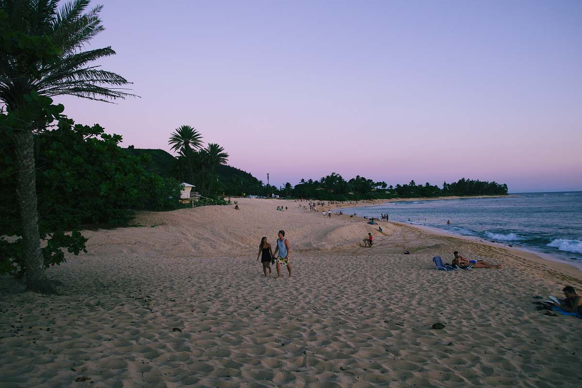 human woman and man walking around beach person