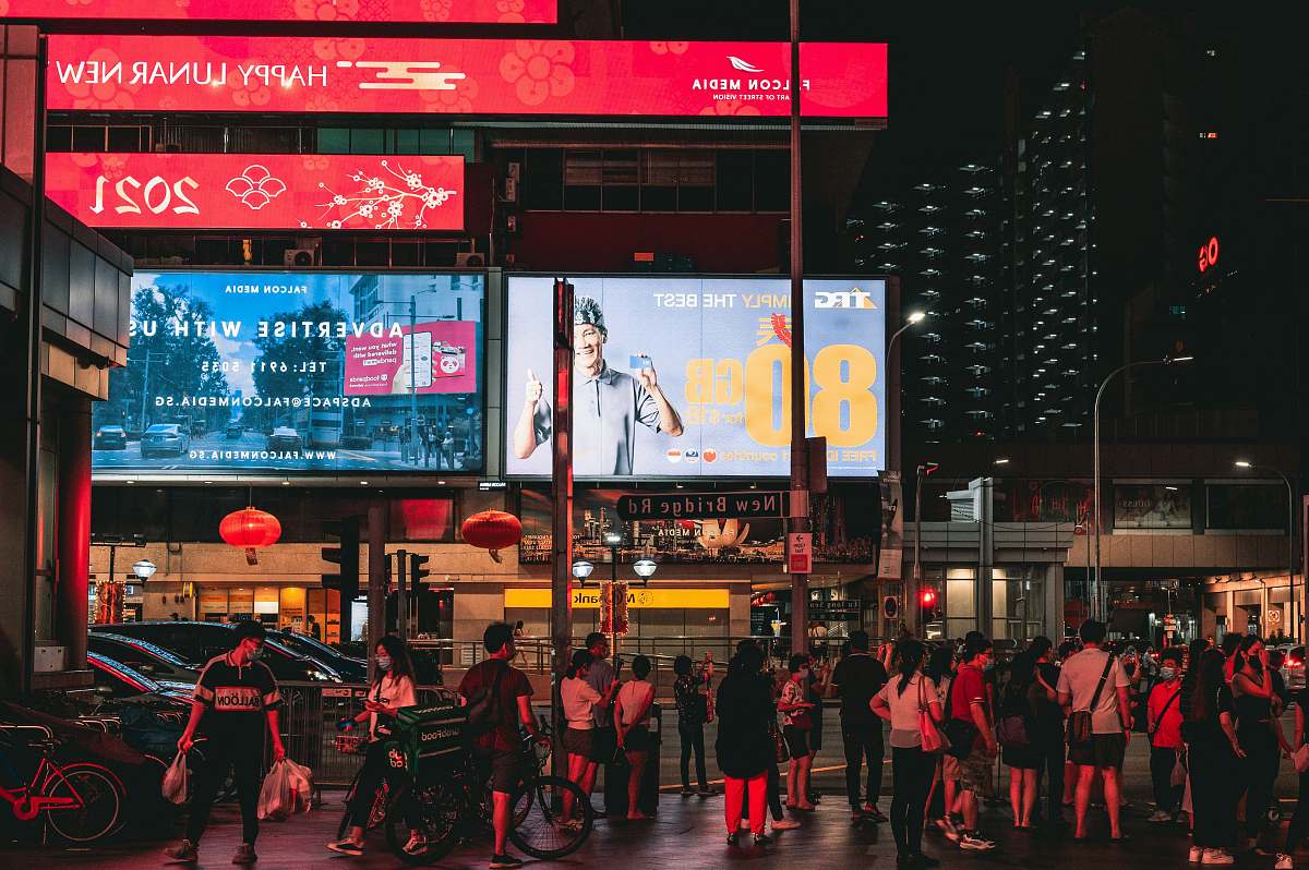 human people walking on street during nighttime person