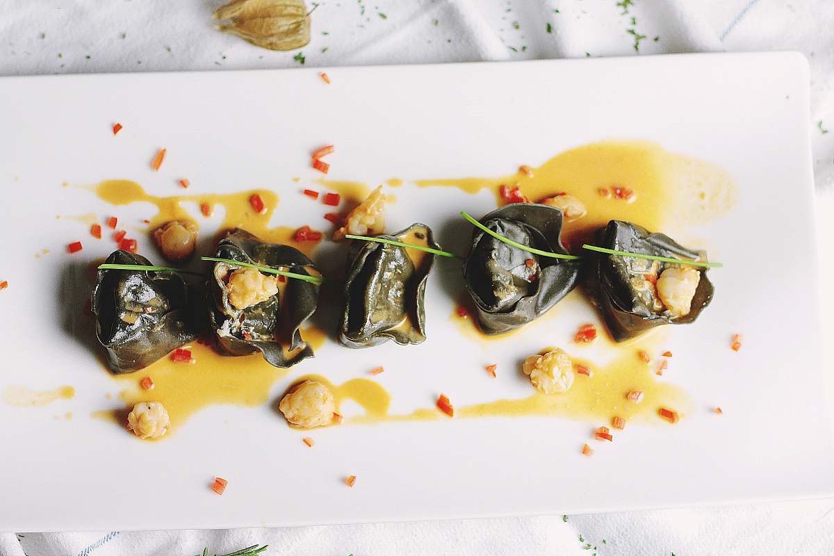 seafood dish served on white plate meal