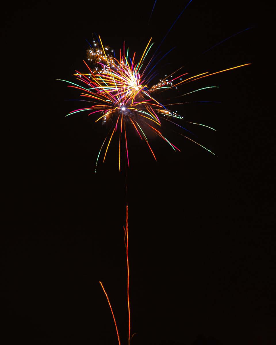 outdoors time-lapse photography of fireworks exploding in the sky during nighttime fireworks