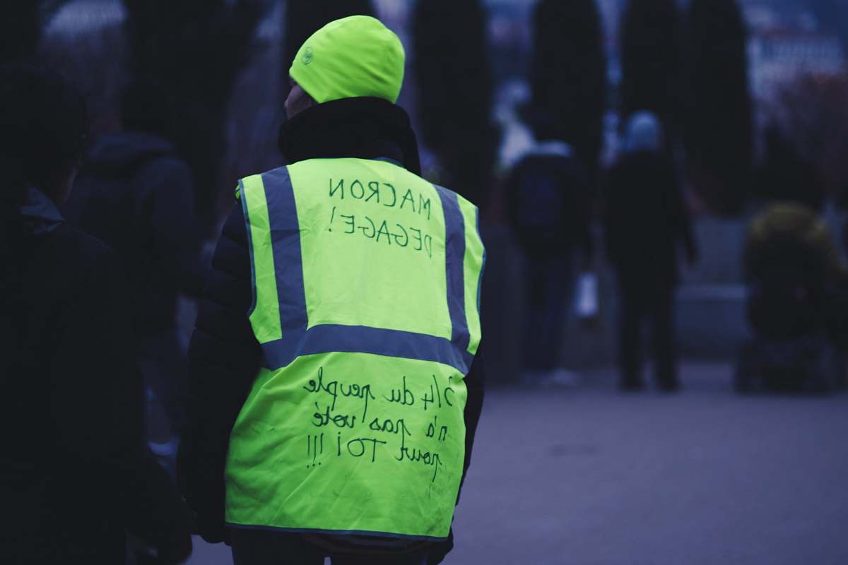clothing man wearing green and gray jacket person