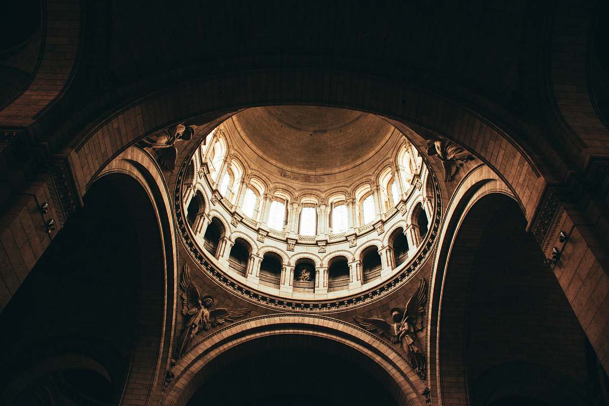 building architectural photography of brown monument interior view paris