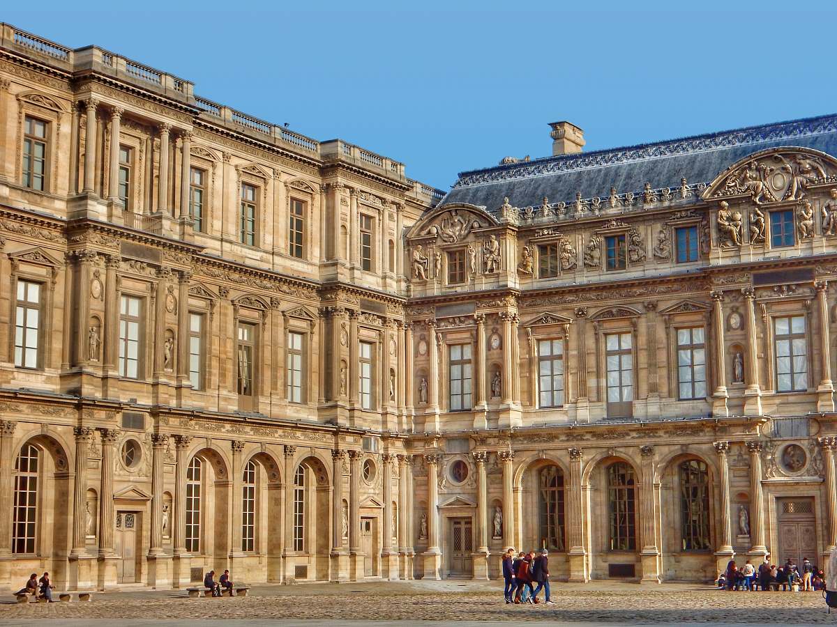 housing brown building during daytime palace