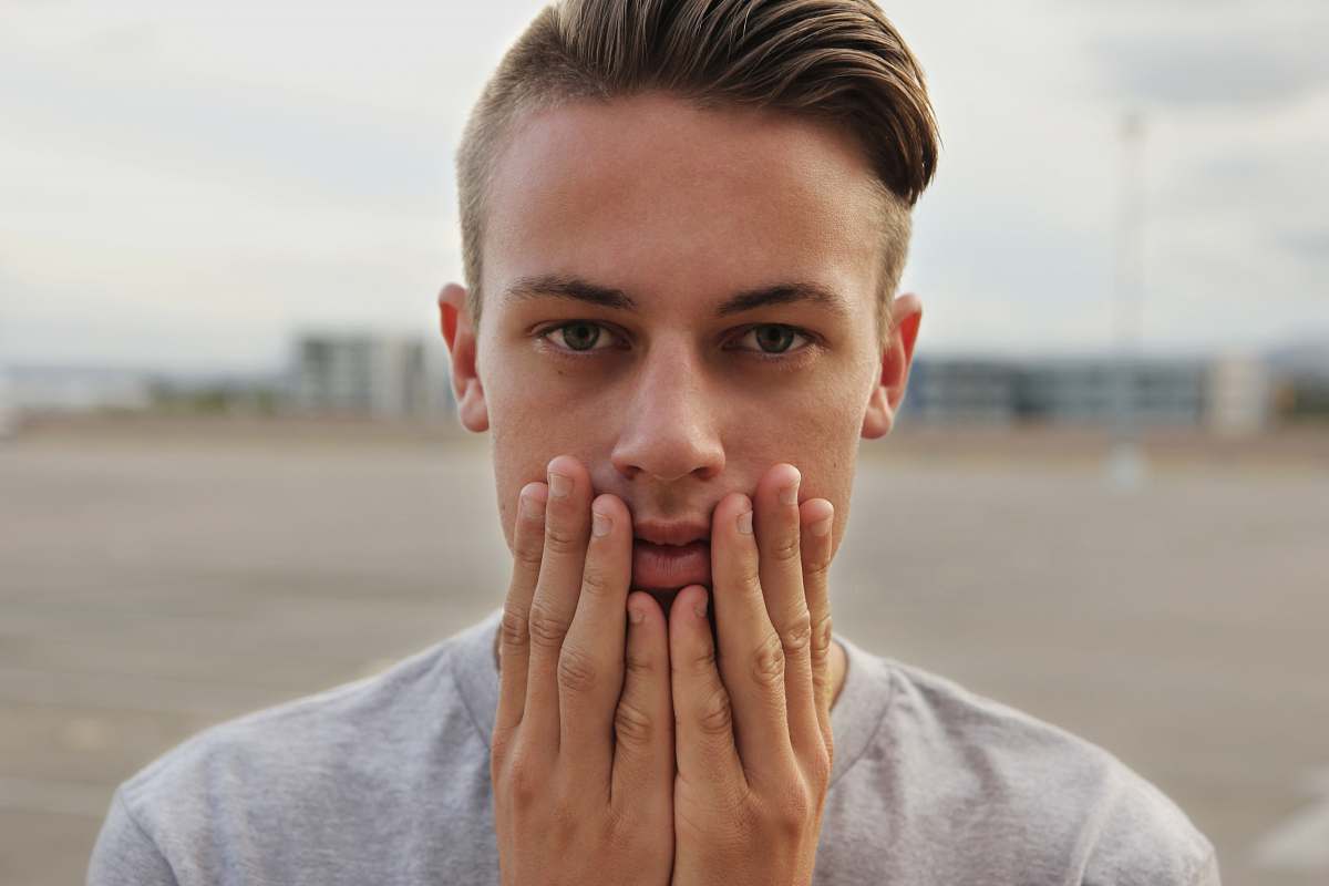face man holding face person