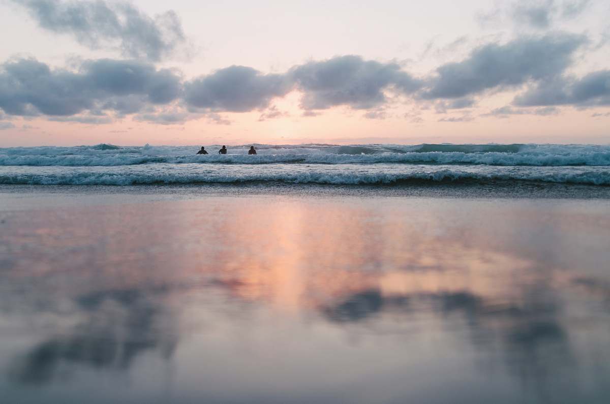 nature ocean under cloudy sky during sunset ocean