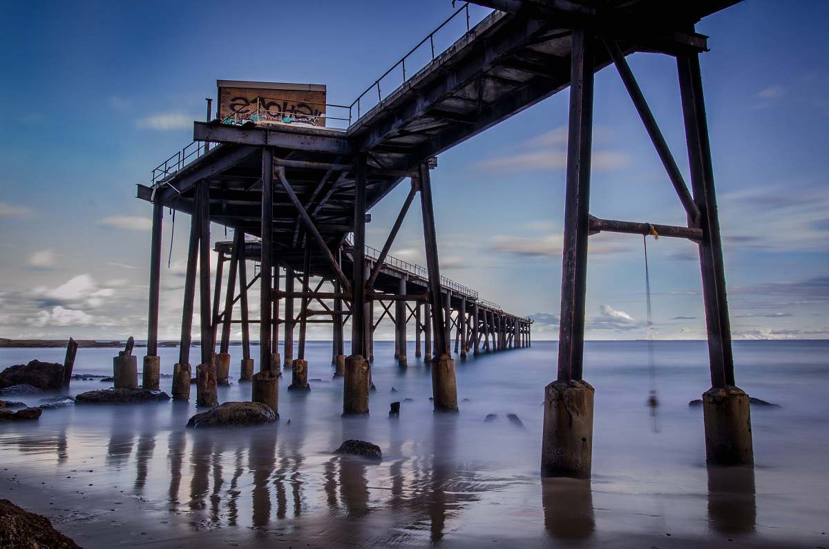 pier white wooden port on a body of water dock