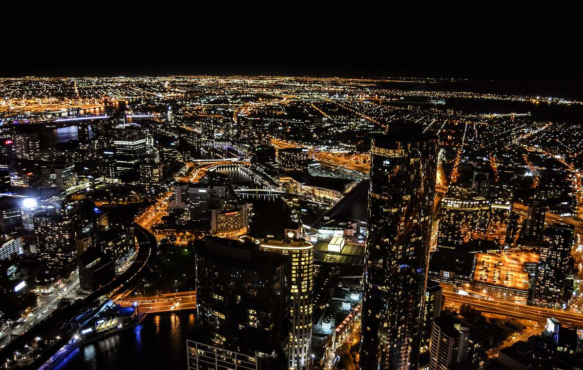 building aerial photography of skyscraper at night time urban