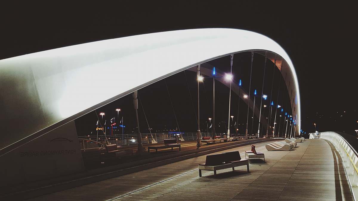 bench brown wooden sofa on concrete road at night bridge