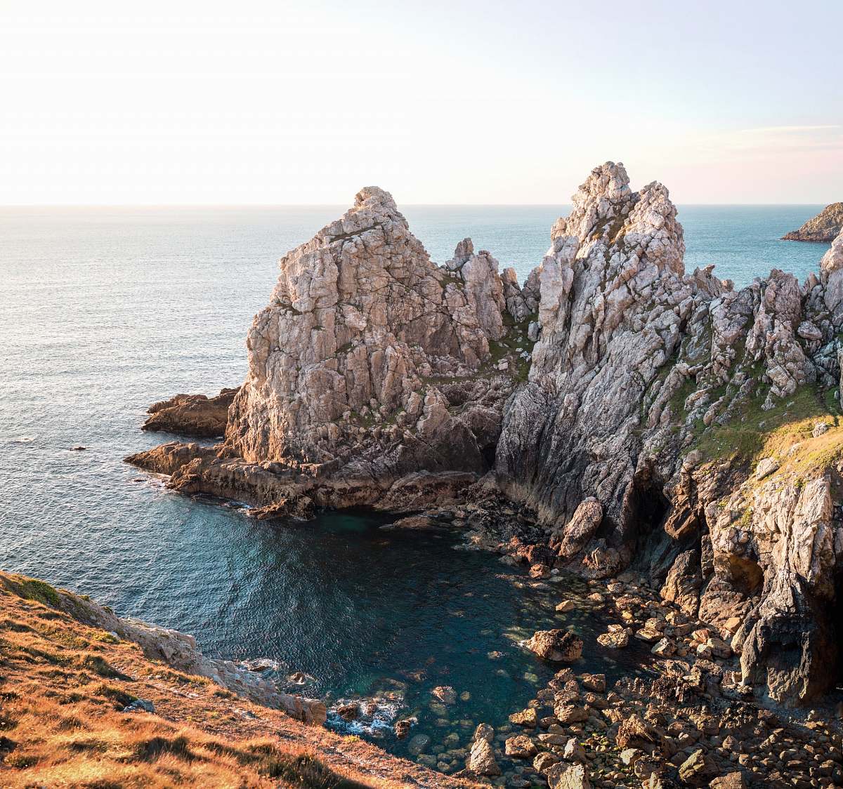 sea rock formation near body of water coast
