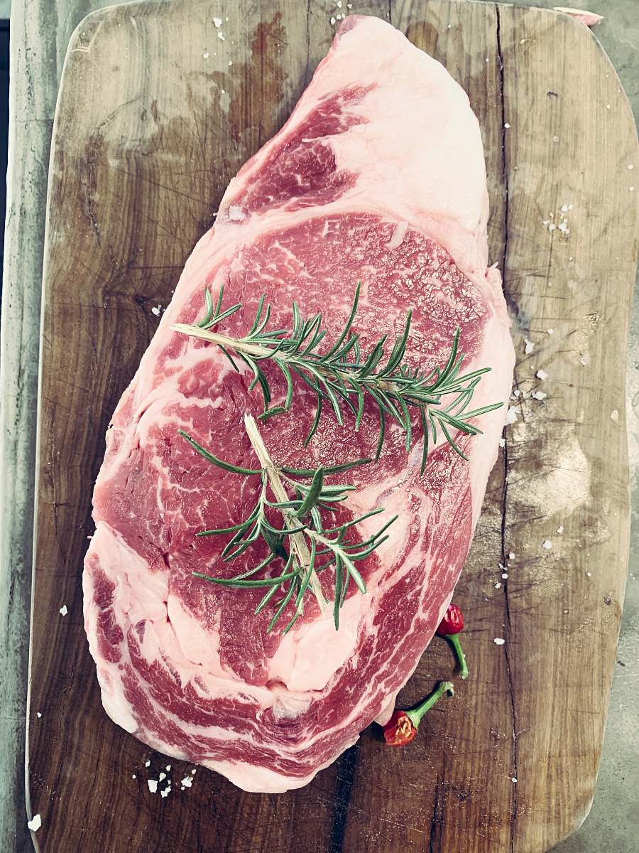 steak two green leaves pork