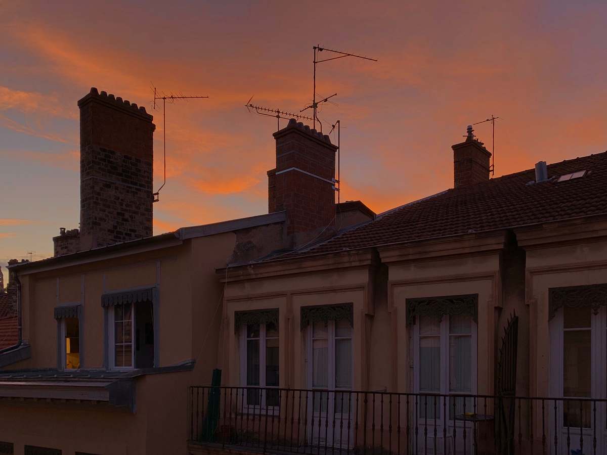 Lyon Building With Antennas And Chimneys During Golden Hour Antenna ...
