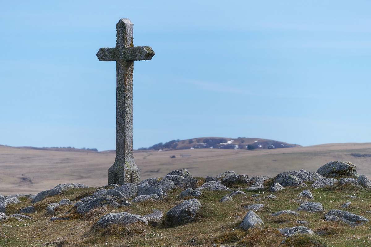 cross view of white cross during daytime symbol