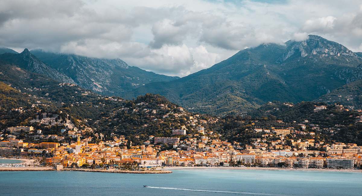 outdoors mountain near ocean water