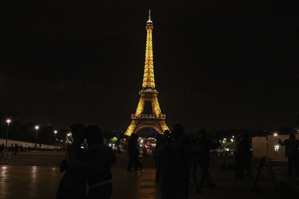 building powered-on lights Eiffel Tower, Paris town