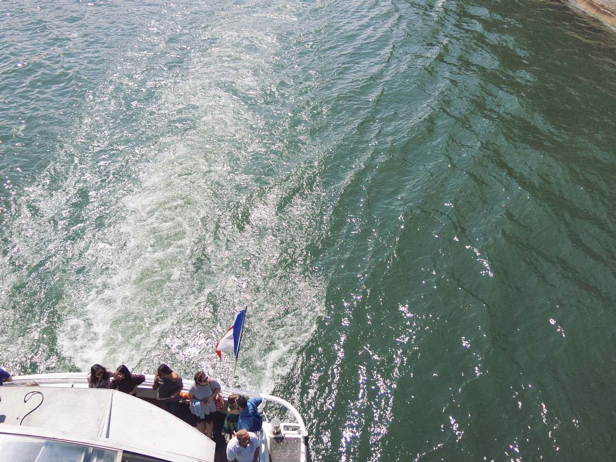 nature people sitting on boat ocean