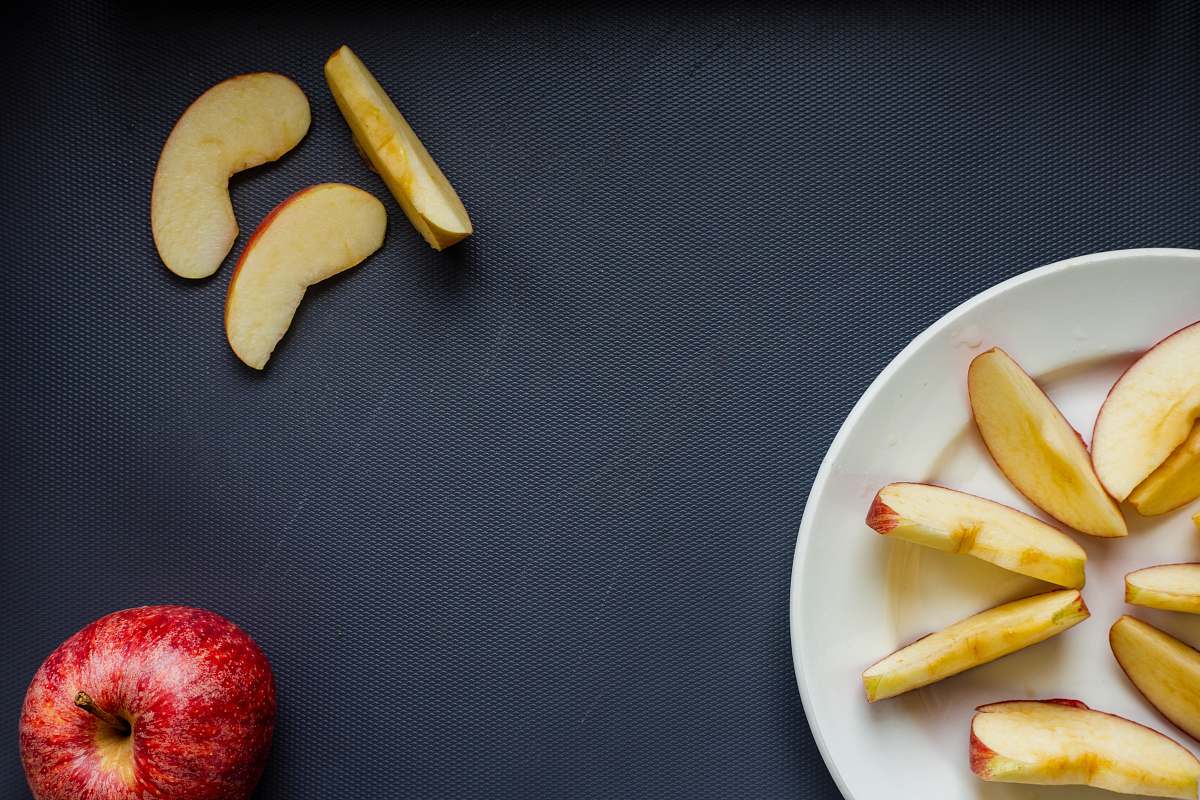 food sliced banana on white ceramic plate plant