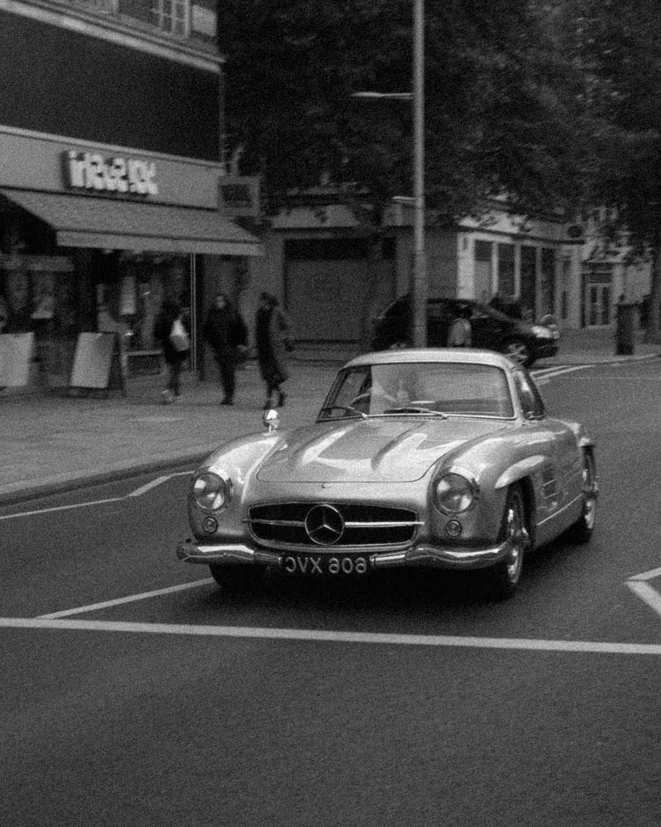 black-and-white silver Mercedes-Benz car on road vehicle