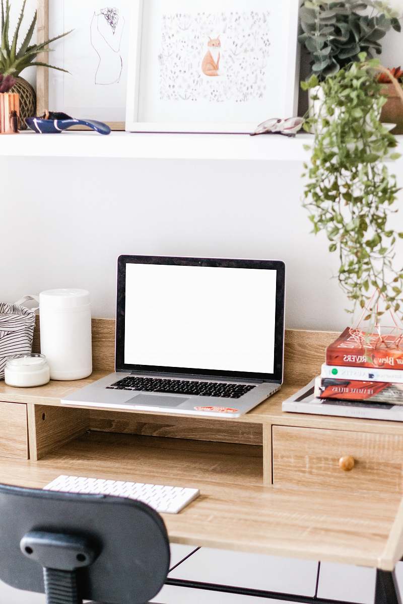 table MacBook Pro turned on furniture
