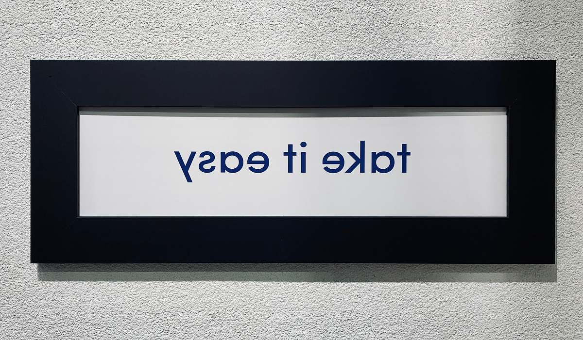 table take it easy text overlay reception desk