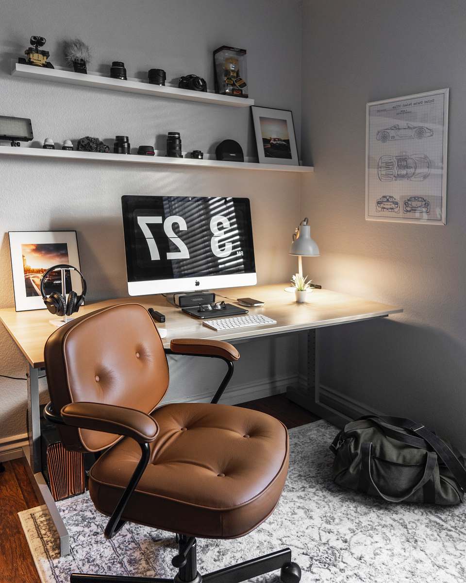 chair turned-on silver iMac table