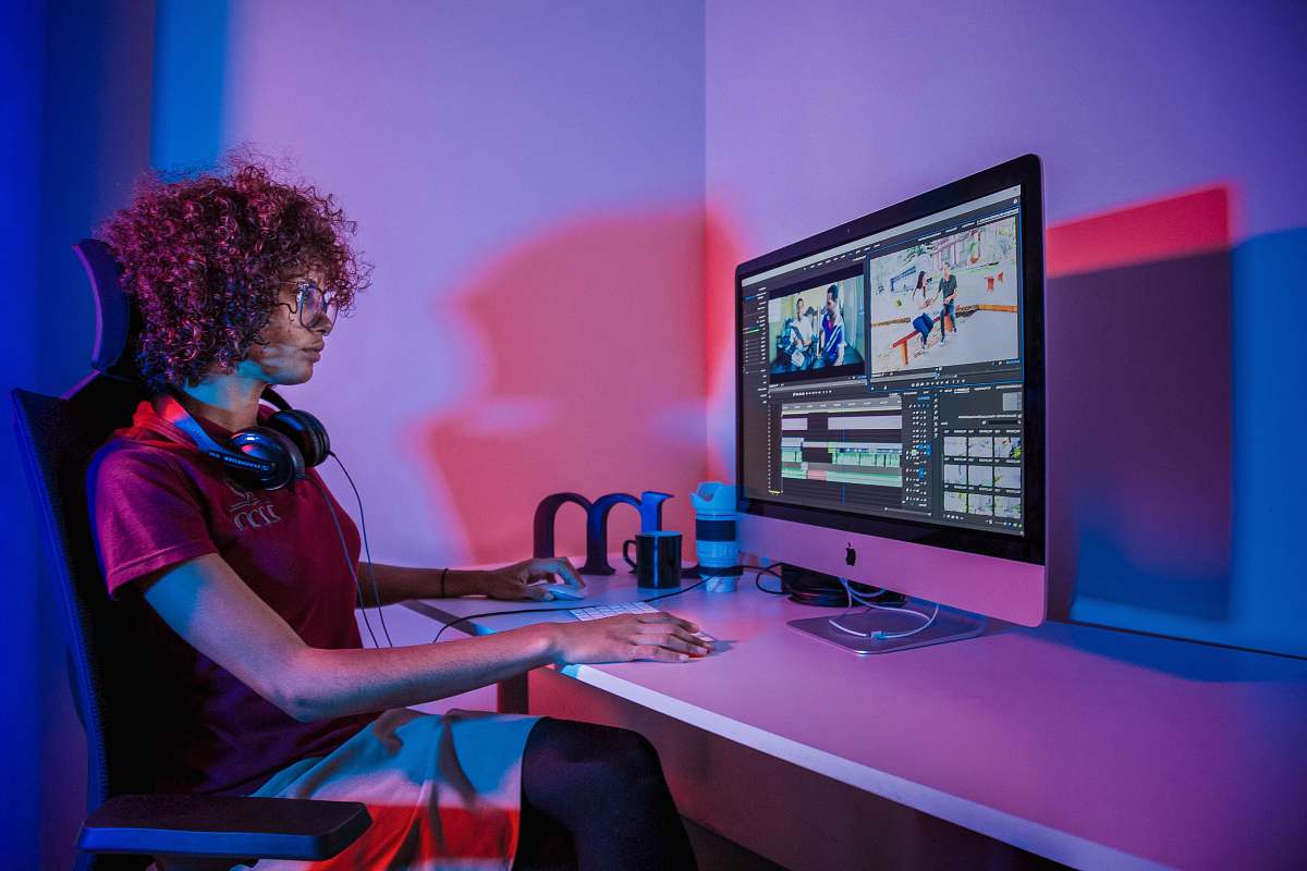 human woman using silver iMac person