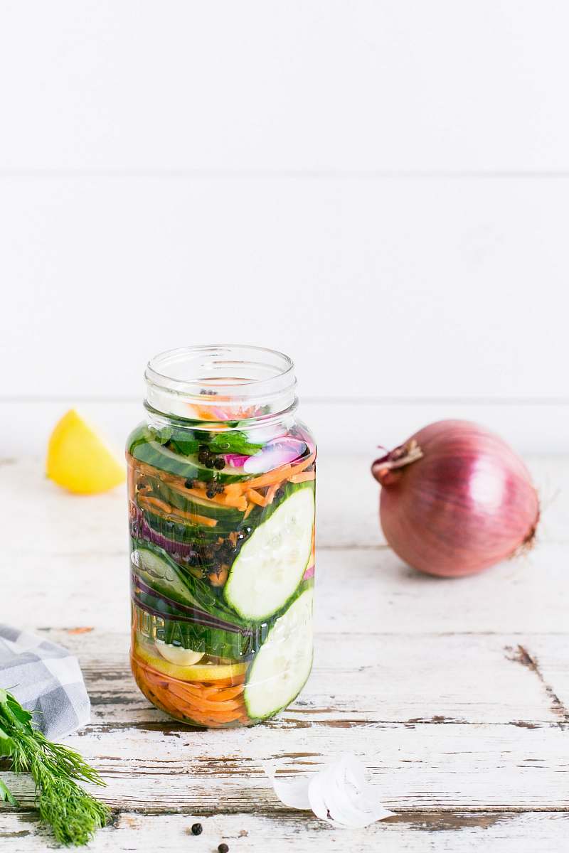food clear glass bottle on white table fruit